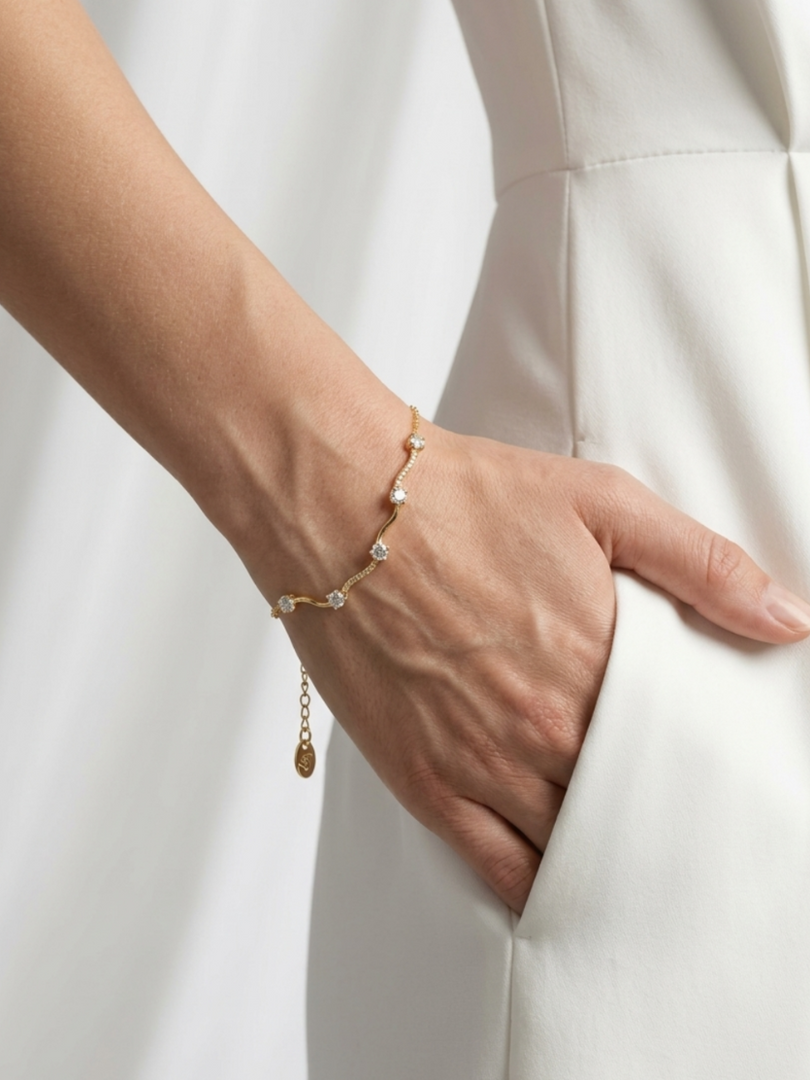 Golden Serpentine Wave Whisper Bracelet