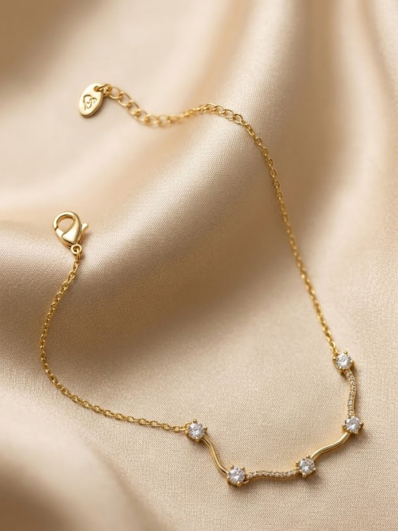 Golden Serpentine Wave Whisper Bracelet