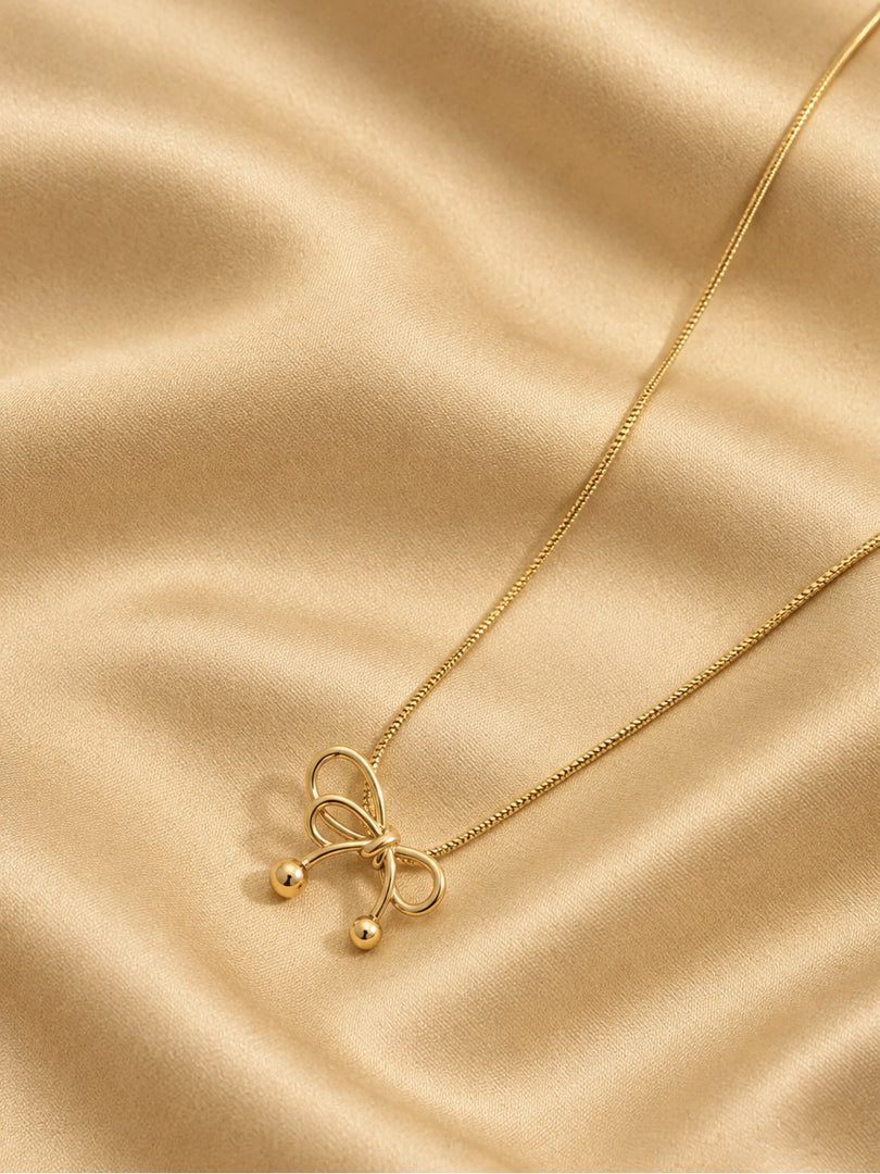 Golden Beaded Ribbon Bow Necklace