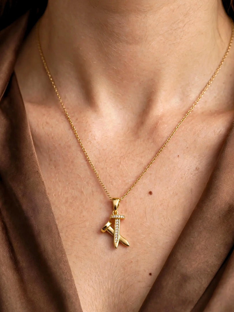 Golden Crossed Nail & Crystal Necklace