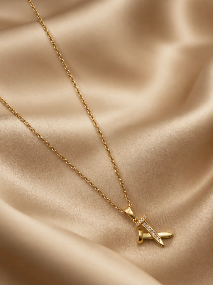 Golden Crossed Nail & Crystal Necklace