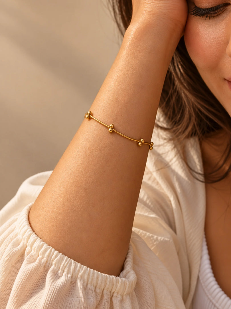 Golden Knot Bar & Bead Bracelet