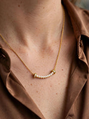Golden Pearl Smile Bar Necklace