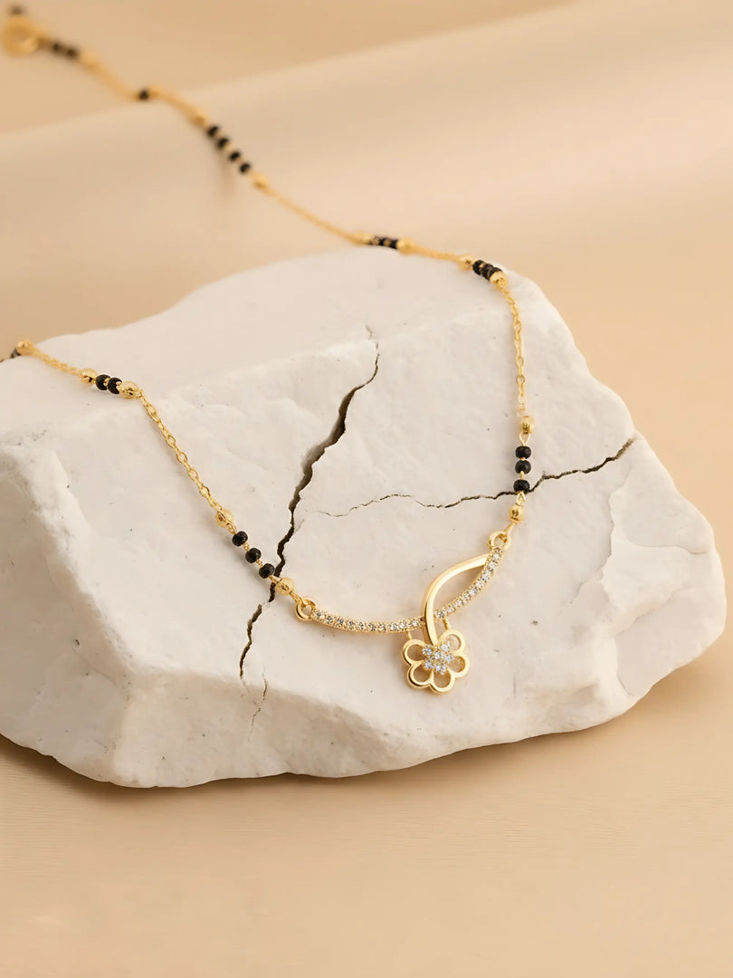 Saubhagya mangalsutra with black beads and gold-toned pendant