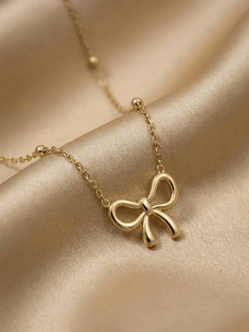 Golden Bow Station Necklace