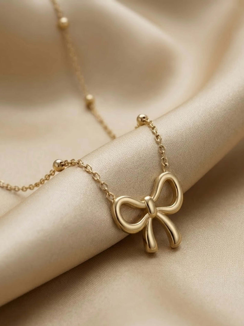 Golden Bow Station Necklace