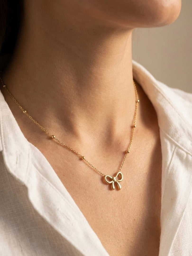 Golden Bow Station Necklace