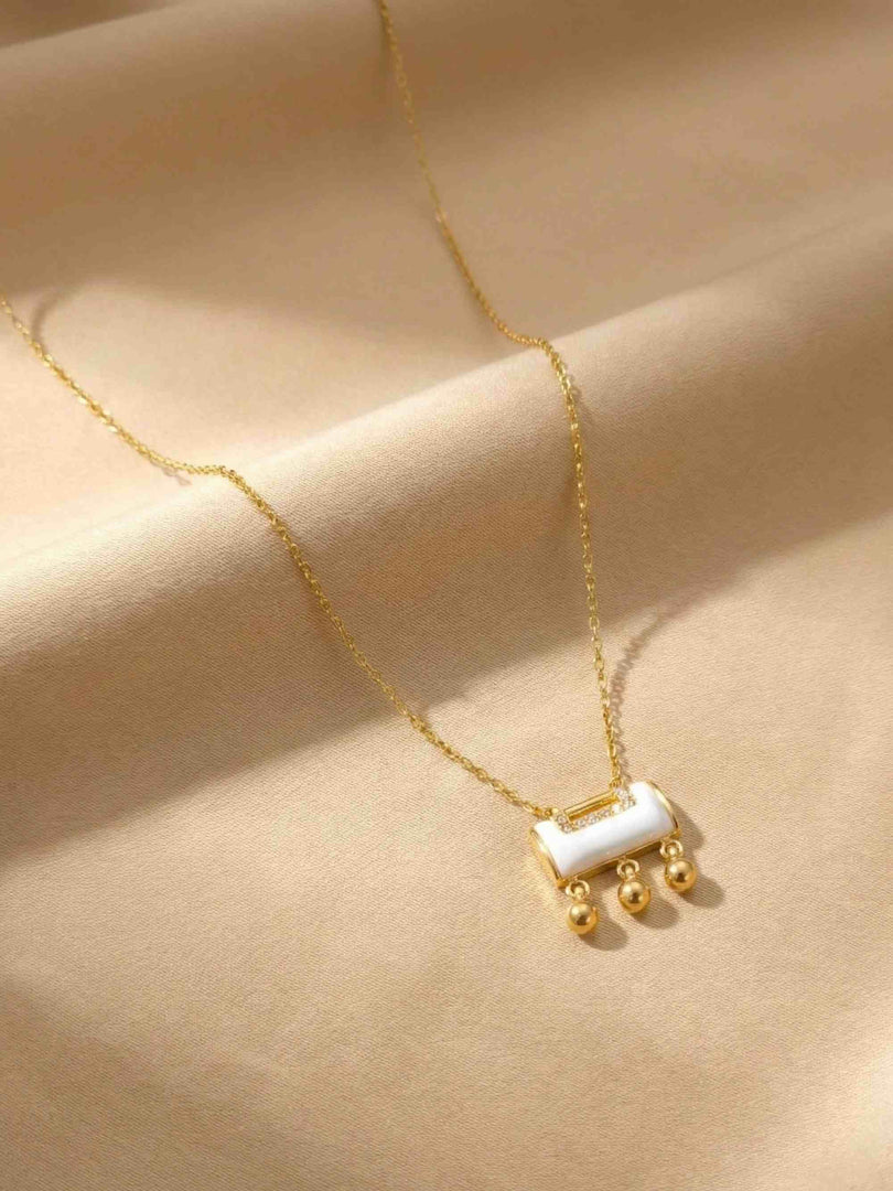 Ivory Cascade Charm Necklace