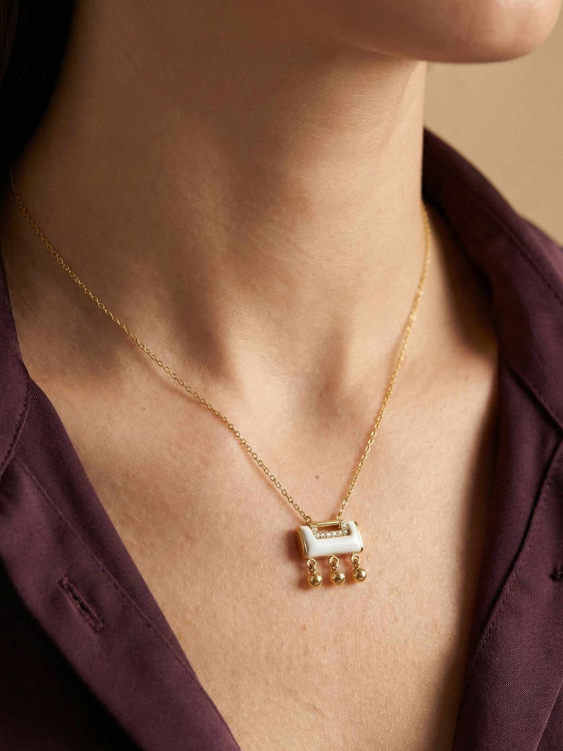 Ivory Cascade Charm Necklace