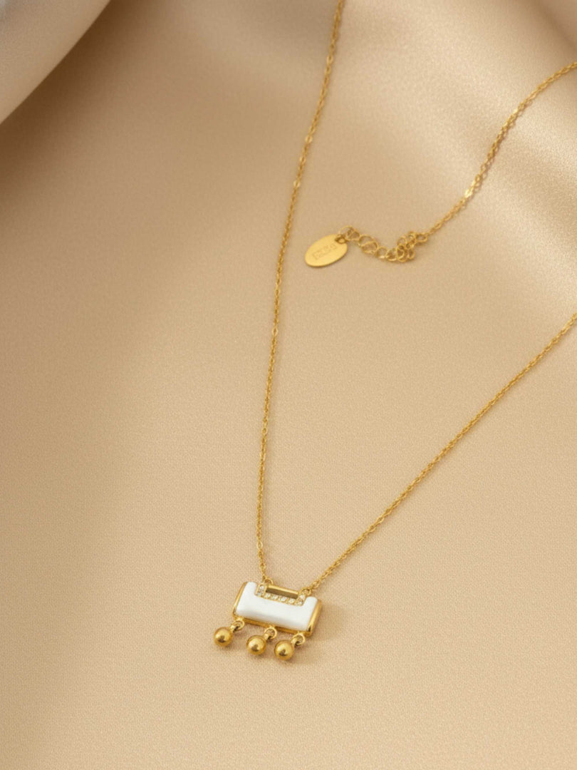 Ivory Cascade Charm Necklace