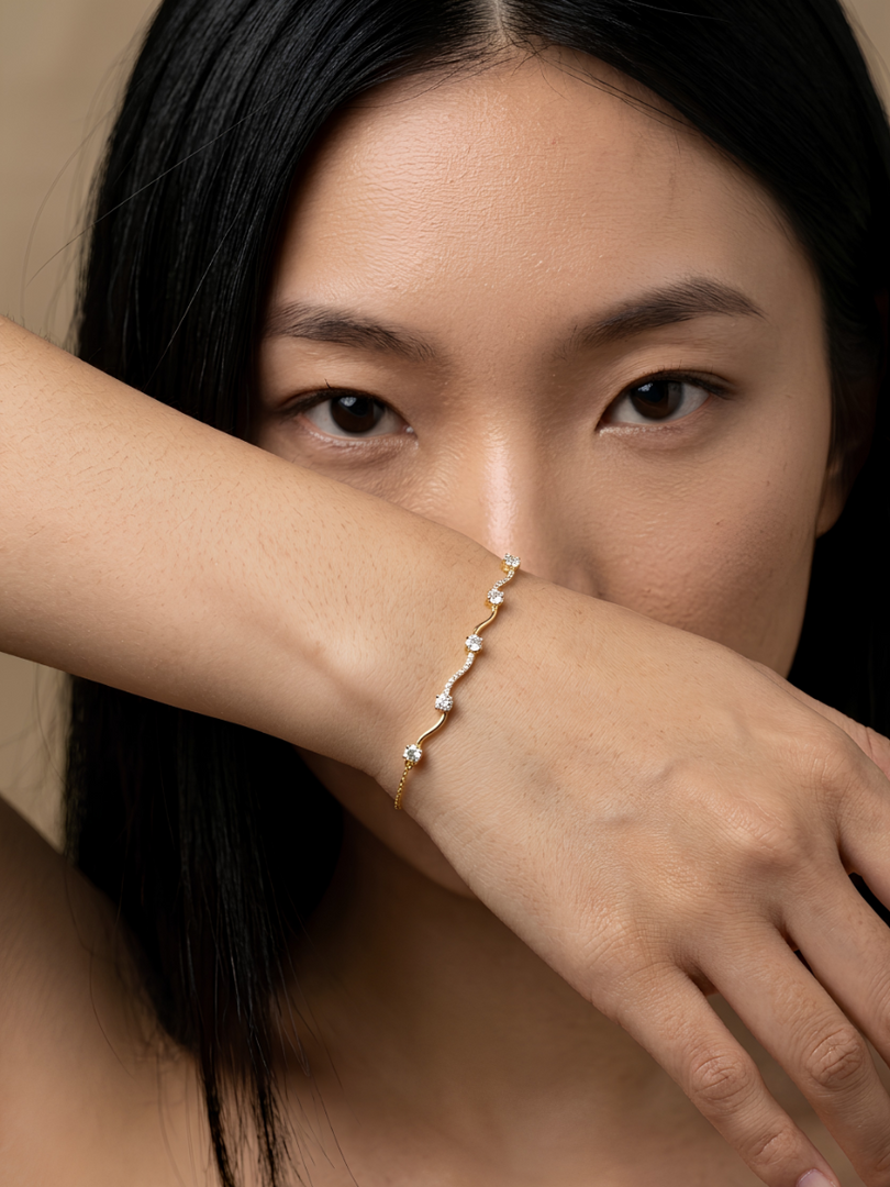 Golden Serpentine Wave Whisper Bracelet