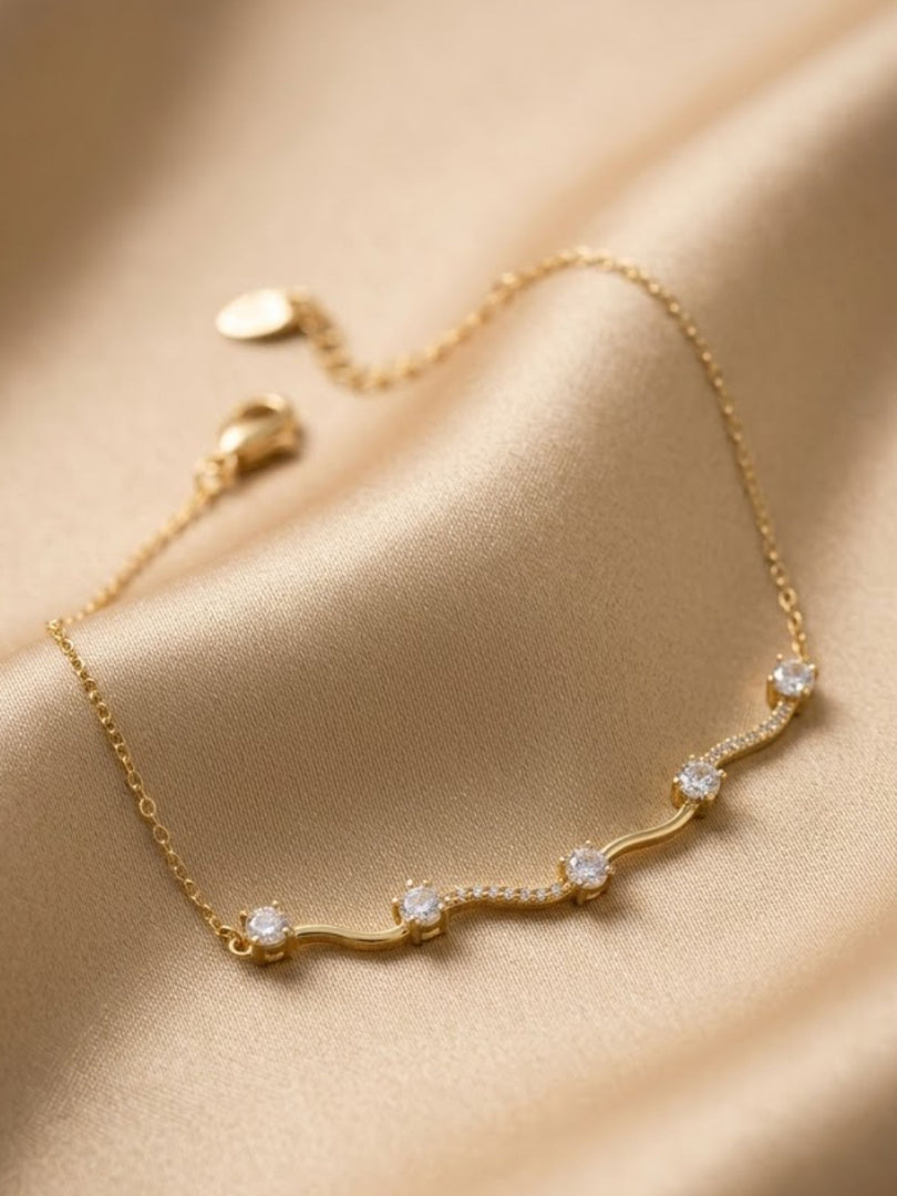 Golden Serpentine Wave Whisper Bracelet