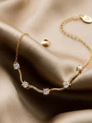 Golden Serpentine Wave Whisper Bracelet